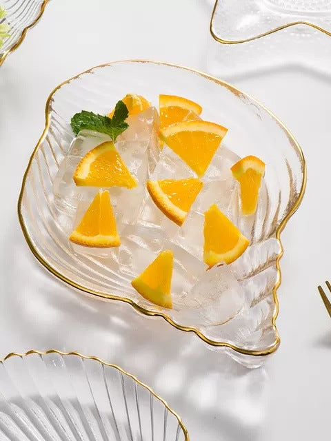 Assiette de vaisselle en verre à bordure dorée